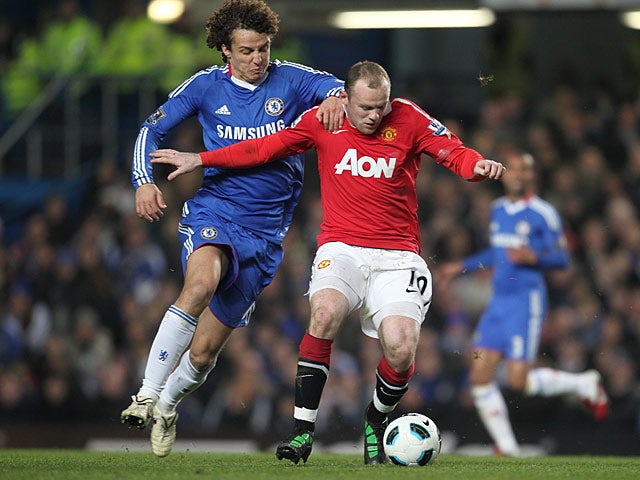 Chelsea's David Luiz and Manchester United's Wayne Rooney battle for the ball on March 1, 2011