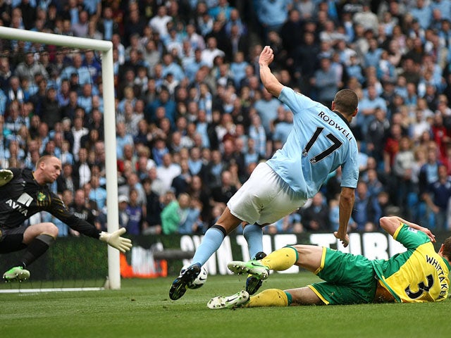 Manchester City's Jack Rodwell scores his second goal against Norwich on May 19, 2013