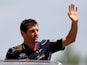 Red Bull driver Mark Webber waves to the crowd on May 12, 2013