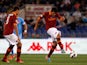 Roma's Marquinho scores the opening goal against Napoli on May 19, 2013
