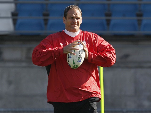 England rugby team manager Martin Johnston watches his team during a training session on September 24, 2011