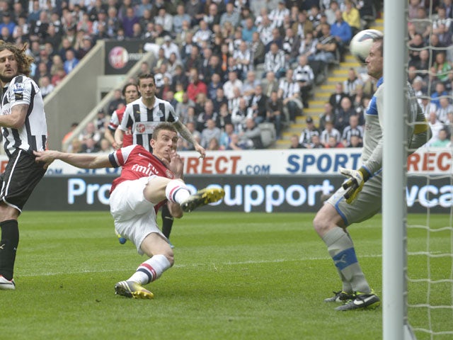 Arsenal Laurent Koscielny scores during the Premier League match against Newcastle on May 19, 2013