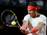 Rafael Nadal returns the ball to Fabio Fognini during the Rome Masters on May 15, 2013