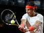 Rafael Nadal returns the ball to Fabio Fognini during the Rome Masters on May 15, 2013