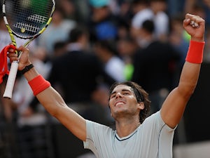 Rafael Nadal celebrates after defeating Tomas Berdych at the Rome Masters on May 18, 2013