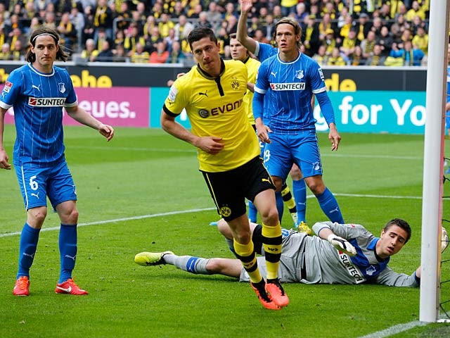 Dortmund's Robert Lewandowski celebrates after scoring the opener against Hoffenheim on May 18, 2013