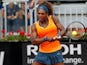 Serena Williams returns the ball to Dominika Cibulkova during their match at the Rome Masters on May 16, 2013