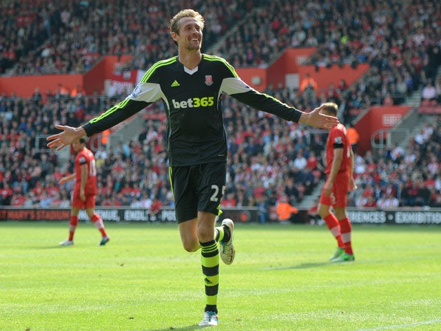 Stoke City's Peter Crouch celebrates scoring against Southampton on May 19, 2013