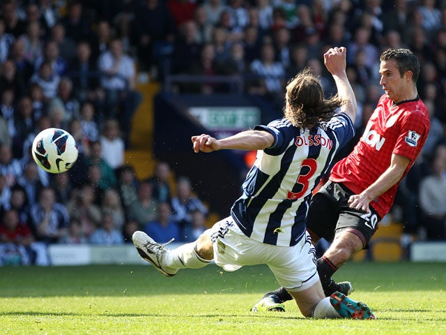 Manchester United's Robin van Persie scores his side's fourth goal against West Brom on May 19, 2013