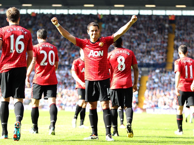 Manchester United's Javier Hernandez celebrates scoring his side's fifth goal against West Brom on May 19, 2013