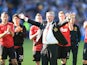 Manchester United manager Sir Alex Ferguson acknowledges the fans after his final game in charge of the club on May 19, 2013