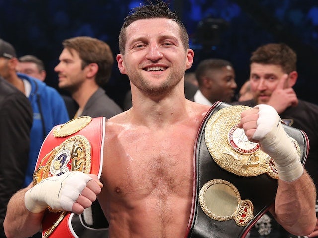 Carl Froch celebrates his win over Mikkel Kessler on May 25, 2013
