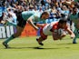 Catalan Dragons' Frederic Vaccari dives over to score a try during the Super League match against London Broncos on May 25, 2013