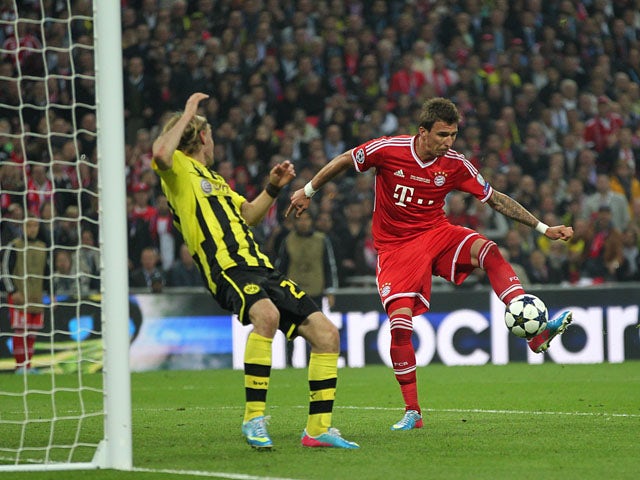 Bayern Munich's Mario Mandzukic scores the first goal of the Champions League Final on May 25, 2013