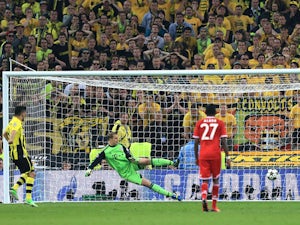 Borussia Dortmund's Ilkay Gundogan scores from the penalty spot during the Champions League Final on May 25, 2013