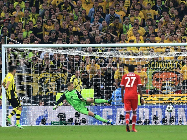 Borussia Dortmund's Ilkay Gundogan scores from the penalty spot during the Champions League Final on May 25, 2013