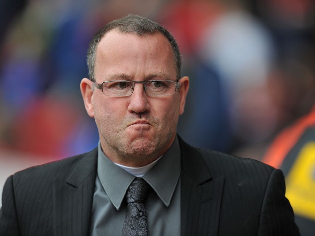 Carlisle United's Manager Greg Abbott during the match against Sheffield United on April 1, 2013