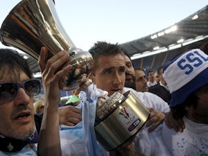 Lazio's Miroslav Klose celebrates winning the Coppa Italia against Roma on May 26, 2013