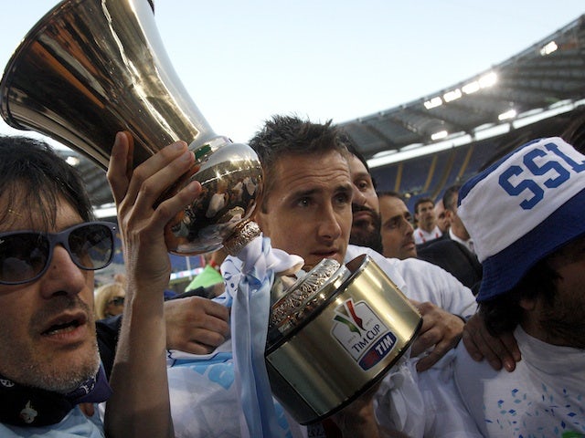 Lazio's Miroslav Klose celebrates winning the Coppa Italia against Roma on May 26, 2013