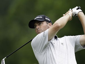 Ryan Palmer watches his tee shot on the fourth hole during the first round of the PGA Championship on May 23, 2013