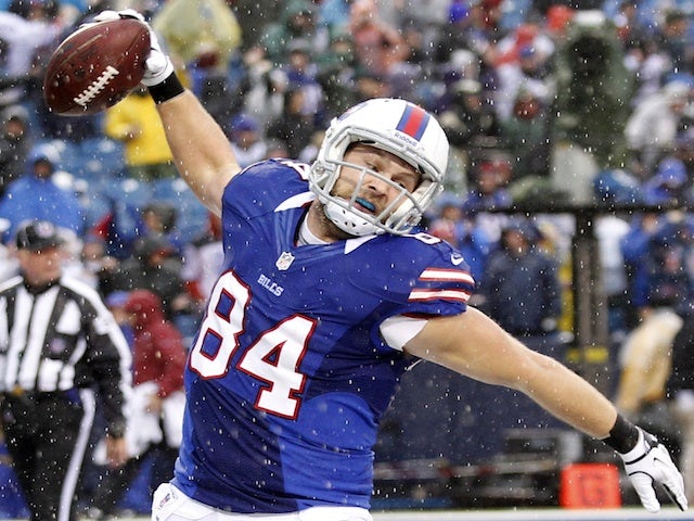 Bills' Scott Chandler celebrates a TD against the Jags on December 2, 2012