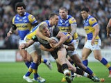 Hull's Chris Green is tackled by Leeds Rhinos' Kevin Sinfield during their Super League match on May 31, 2013