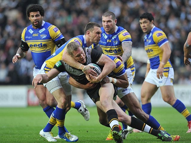Hull's Chris Green is tackled by Leeds Rhinos' Kevin Sinfield during their Super League match on May 31, 2013