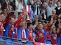 Crystal Palace players celebrate with the Football League Championship play off final trophy on May 27, 2013