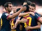 Barcelona's David Villa is congratulated by team mates after scoring the opening goal against Malaga on June 1, 2013