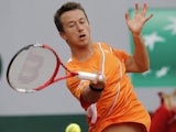 Germany's Philipp Kohlschreiber returns the ball to Czech Republic's Jiri Vesely during their first round match of the French Open tennis tournament on May 28, 2013