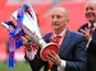 Crystal Palace manager Ian Holloway celebrates with the npower Football League Championship play off final trophy on May 27, 2013