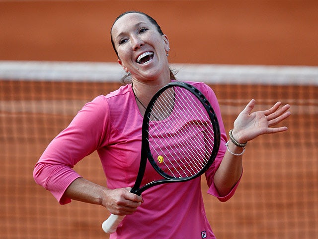 Jelena Jankovic celebrates after defeating Samantha Stosur during their third round match of the French Open on June 1, 2013