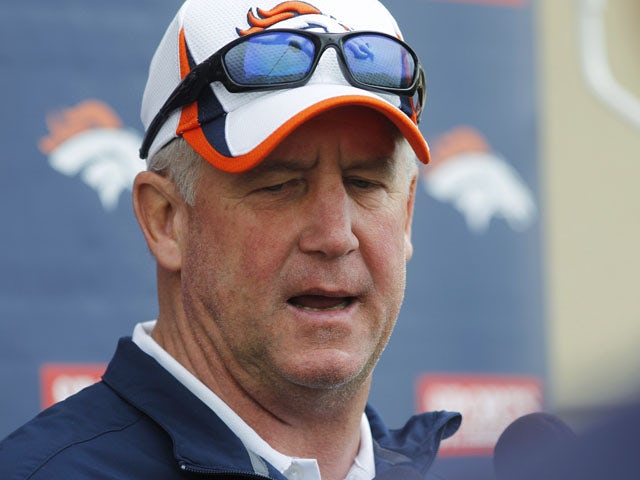 Denver Broncos head coach John Fox talks to reporters on May 20, 2013