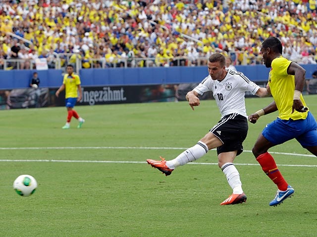 Germany's Lukas Podolski scores his team's third goal against Ecuador on May 29, 2013