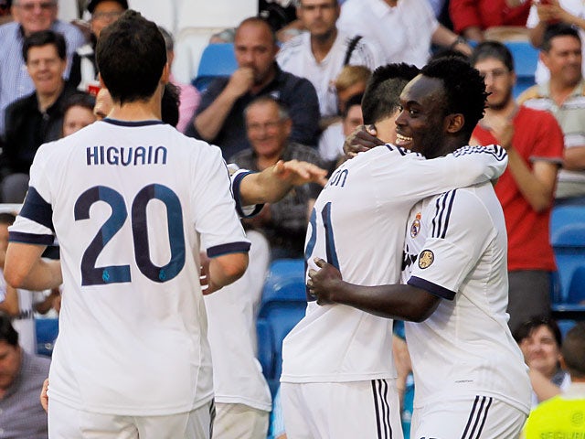 Real's Michael Essien is congratulated by team mates after scoring his team's second against Osasuna on June 1, 2013