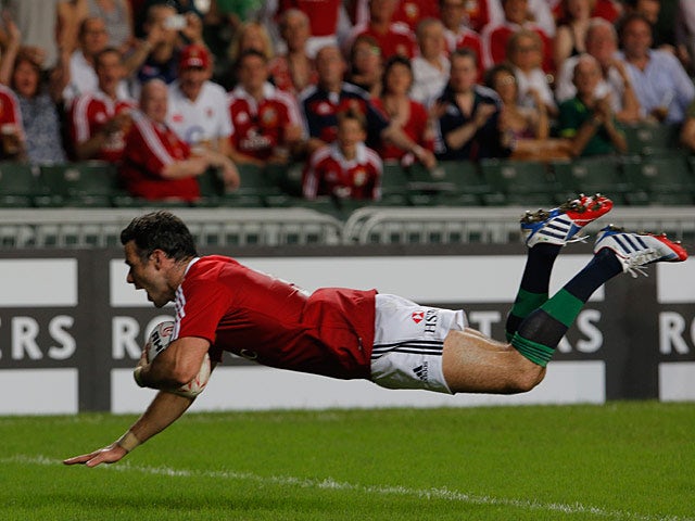 British and Irish Lions' Mike Phillips scores a try against the Barbarians on June 1, 2013