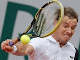 Richard Gasquet returns the ball to Michal Przysiezny during their second round match of the French Open on May 31, 2013
