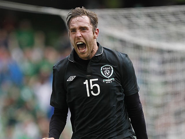 Ireland's Richard Keogh celebrates after scoring the opening goal against Georgia in a friendly match on June 2, 2013