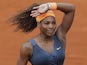 Serena Williams waves to fans after defeating Sorana Cirstea during their third round match of the French Open on May 31, 2013