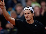 Tommy Haas celebrates after defeating Jack Sock during their second round match of the French Open on May 31, 2013