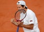 Tommy Haas celebrates after defeating John Isner during their third round match of the French Open on June 1, 2013