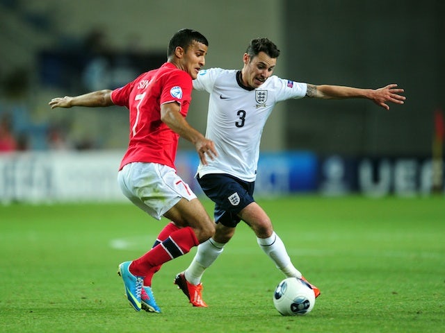 England's Adam Smith in action against Norway on June 8, 2013