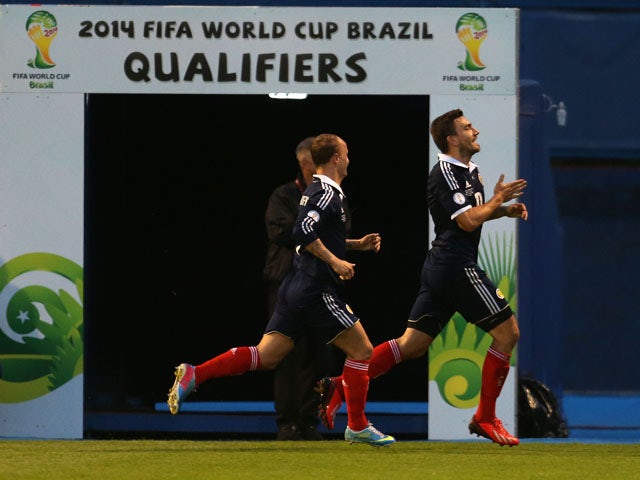 Scotands Robert Snodgrass celebrates scoring during against Croatia during the World Cup qualifying match on June 7, 2013