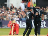 England's Ian Bell sinks to his knees after being caught out off the bowling of New Zealand's Mitchell McClenaghan during the third ODI on June 5, 2013