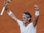 Spain's Rafael Nadal celebrates defeating Switzerland's Stanislas Wawrinka in three sets in their Quarter Final match of the French Open tennis tournament on June 5, 2013