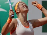Victoria Azarenka celebrates he win over Russia's Maria Kirilenko during their quarterfinal match of the French Open tennis tournament on June 5, 2013