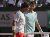 Spain's Rafael Nadal and Serbia's Novak Djokovic hug after their semifinal match of the French Open tennis tournament on June 7, 2013