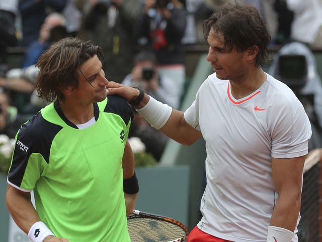 Spain's Rafael Nadal and compatriot David Ferrer congratulate each other after the men's final match of the French Open tennis tournament on June 9, 2013