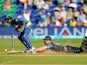 New Zealand's Mitchell McClenaghan dives in to make his ground and score the winning run during the match against Sri Lanka on June 9, 2013