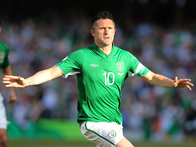 Republic of Ireland's Robbie Keane celebrates after scoring against the Faroe Islands on June 7, 2013